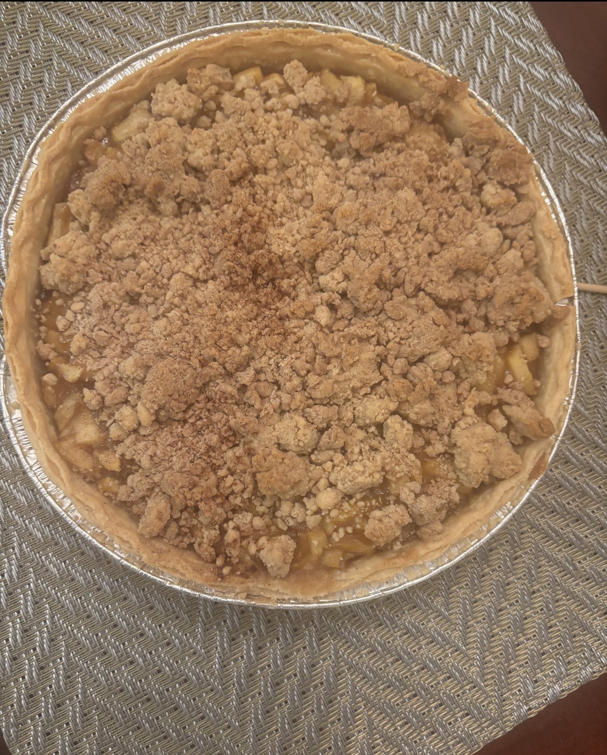 Homemade apple pie with a cinnamon crumble topping baked by Mya